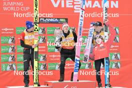 02.04.2023, Planica, Slovenia (SLO): Ski Jumping Overall World Cup, 2nd place, Stefan Kraft (AUT), 1st place, Halvor Egner Granerud (NOR), 3rd place, Anze Lanisek (SLO), (l-r) - FIS world cup ski flying men, cups, Planica (SLO). www.nordicfocus.com. © Reichert/NordicFocus. Every downloaded picture is fee-liable.