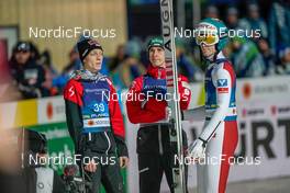 25.02.2023, Planica, Slovenia (SLO): Jan Hoerl (AUT), Piotr Zyla (POL), Michael Hayboeck (AUT), (l-r)  - FIS nordic world ski championships ski jumping men, individual HS100, Planica (SLO). www.nordicfocus.com. © Thibaut/NordicFocus. Every downloaded picture is fee-liable.