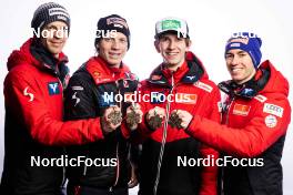 25.02.2023, Planica, Slovenia (SLO): Michael Hayboeck (AUT), Jan Hoerl (AUT), Daniel Tschofenig (AUT), Stefan Kraft (AUT), (l-r)  - FIS nordic world ski championships ski jumping men, medals, Planica (SLO). www.nordicfocus.com. © Modica/NordicFocus. Every downloaded picture is fee-liable.