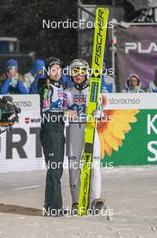26.02.2023, Planica, Slovenia (SLO): Nika Kriznar (SLO), Ema Klinec (SLO), (l-r)  - FIS nordic world ski championships ski jumping men, mixed team HS100, Planica (SLO). www.nordicfocus.com. © Thibaut/NordicFocus. Every downloaded picture is fee-liable.