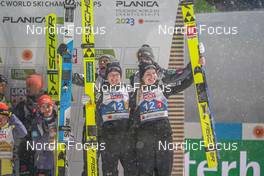 26.02.2023, Planica, Slovenia (SLO): Timi Zajc (SLO), Nika Kriznar (SLO), (l-r)  - FIS nordic world ski championships ski jumping men, mixed team HS100, Planica (SLO). www.nordicfocus.com. © Thibaut/NordicFocus. Every downloaded picture is fee-liable.