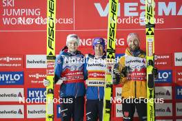 17.12.2023, Engelberg, Switzerland (SUI): Jan Hoerl (AUT), Stefan Kraft (AUT), Pius Paschke (GER), (l-r) - FIS world cup ski jumping men, individual HS140, Engelberg (SUI). www.nordicfocus.com. © Thibaut/NordicFocus. Every downloaded picture is fee-liable