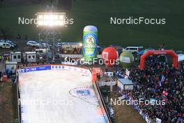 01.01.2023, Ljubno, Slovenia (SLO): Event Feature: Overview over the outrun with fans and flags - FIS world cup ski jumping women, individual HS94, Ljubno (SLO). www.nordicfocus.com. © Manzoni/NordicFocus. Every downloaded picture is fee-liable.