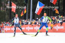 06.01.2024, Oberhof, Germany (GER): Johannes Kuehn (GER), Jakov Fak (SLO), (l-r) - IBU World Cup Biathlon, pursuit men, Oberhof (GER). www.nordicfocus.com. © Manzoni/NordicFocus. Every downloaded picture is fee-liable.