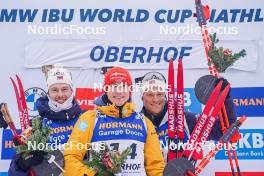 05.01.2024, Oberhof, Germany (GER): Sturla Holm Laegreid (NOR), Benedikt Doll (GER), Endre Stroemsheim (NOR), (l-r) - IBU World Cup Biathlon, sprint men, Oberhof (GER). www.nordicfocus.com. © Thibaut/NordicFocus. Every downloaded picture is fee-liable.