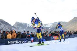 14.01.2024, Ruhpolding, Germany (GER): Martin Ponsiluoma (SWE), Sebastian Samuelsson (SWE), (l-r) - IBU World Cup Biathlon, pursuit men, Ruhpolding (GER). www.nordicfocus.com. © Manzoni/NordicFocus. Every downloaded picture is fee-liable.