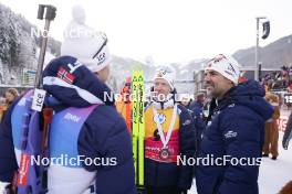 14.01.2024, Ruhpolding, Germany (GER): Johannes Thingnes Boe (NOR), Siegfried Mazet (FRA) coach team Norway, (l-r) - IBU World Cup Biathlon, pursuit men, Ruhpolding (GER). www.nordicfocus.com. © Thibaut/NordicFocus. Every downloaded picture is fee-liable.