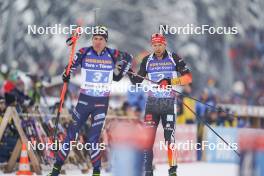 11.01.2024, Ruhpolding, Germany (GER): Quentin Fillon Maillet (FRA), Philipp Nawrath (GER), (l-r) - IBU World Cup Biathlon, relay men, Ruhpolding (GER). www.nordicfocus.com. © Thibaut/NordicFocus. Every downloaded picture is fee-liable.