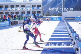 20.01.2024, Antholz, Italy (ITA): Emilien Jacquelin (FRA), Simon Eder (AUT), (l-r) - IBU World Cup Biathlon, single mixed relay, Antholz (ITA). www.nordicfocus.com. © Thibaut/NordicFocus. Every downloaded picture is fee-liable.