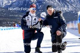 15.03.2024, Canmore, Canada (CAN): Johannes Thingnes Boe (NOR), Olle Dahlin (SWE), IBU President, (l-r) - IBU World Cup Biathlon, cups, Canmore (CAN). www.nordicfocus.com. © Manzoni/NordicFocus. Every downloaded picture is fee-liable.