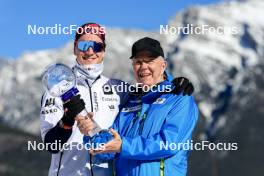 17.03.2024, Canmore, Canada (CAN): Johannes Thingnes Boe (NOR), Olle Dahlin (SWE), IBU President, (l-r) - IBU World Cup Biathlon, cups, Canmore (CAN). www.nordicfocus.com. © Manzoni/NordicFocus. Every downloaded picture is fee-liable.
