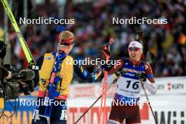 18.02.2024, Nove Mesto na Morave, Czechia (CZE): Johannes Thingnes Boe (NOR), Andrejs Rastorgujevs (LAT), (l-r) - IBU World Championships Biathlon, mass men, Nove Mesto na Morave (CZE). www.nordicfocus.com. © Manzoni/NordicFocus. Every downloaded picture is fee-liable.