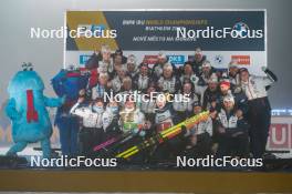 15.02.2024, Nove Mesto na Morave, Czechia (CZE): Ingrid Landmark Tandrevold (NOR), Johannes Thingnes Boe (NOR) and Norway team, (l-r) - IBU World Championships Biathlon, medals, Nove Mesto na Morave (CZE). www.nordicfocus.com. © Thibaut/NordicFocus. Every downloaded picture is fee-liable.