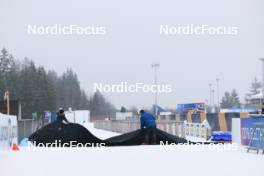 08.02.2024, Nove Mesto na Morave, Czechia (CZE): Feature: Track atmosphere with undefined technicians at work - IBU World Championships Biathlon, training, Nove Mesto na Morave (CZE). www.nordicfocus.com. © Manzoni/NordicFocus. Every downloaded picture is fee-liable.