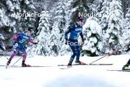 01.01.2024, Toblach, Italy (ITA): Gus Schumacher (USA), Federico Pellegrino (ITA), (l-r)  - FIS world cup cross-country, tour de ski, pursuit, Toblach (ITA). www.nordicfocus.com. © Modica/NordicFocus. Every downloaded picture is fee-liable.