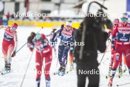 04.01.2024, Davos, Switzerland (SUI): Nadine Faehndrich (SUI), Delphine Claudel (FRA), (l-r)  - FIS world cup cross-country, tour de ski, pursuit, Davos (SUI). www.nordicfocus.com. © Modica/NordicFocus. Every downloaded picture is fee-liable.