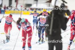 04.01.2024, Davos, Switzerland (SUI): Nadine Faehndrich (SUI), Delphine Claudel (FRA), Lisa Lohmann (GER), (l-r)  - FIS world cup cross-country, tour de ski, pursuit, Davos (SUI). www.nordicfocus.com. © Modica/NordicFocus. Every downloaded picture is fee-liable.