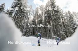 04.01.2024, Davos, Switzerland (SUI): Jens Burman (SWE), William Poromaa (SWE), (l-r)  - FIS world cup cross-country, tour de ski, pursuit, Davos (SUI). www.nordicfocus.com. © Modica/NordicFocus. Every downloaded picture is fee-liable.