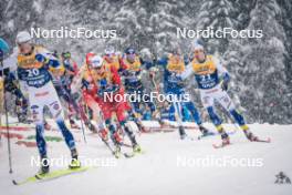 06.01.2024, Val di Fiemme, Italy (ITA): Martin Loewstroem Nyenget (NOR), Calle Halfvarsson (SWE), (l-r)  - FIS world cup cross-country, tour de ski, mass, Val di Fiemme (ITA). www.nordicfocus.com. © Barbieri/NordicFocus. Every downloaded picture is fee-liable.