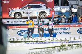 01.01.2024, Garmisch, Germany (GER): Andreas Wellinger (GER), Anze Lanisek (SLO), Ryoyu Kobayashi (JPN), (l-r) - FIS world cup ski jumping men, four hills tournament, individual HS142, Garmisch (GER). www.nordicfocus.com. © Reichert/NordicFocus. Every downloaded picture is fee-liable.