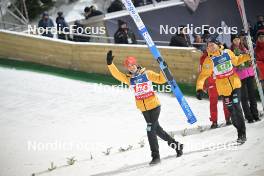 13.01.2024, Wisla, Poland (POL): Stephan Leyhe (GER), Andreas Wellinger (GER), (l-r) - FIS world cup ski jumping men, super team HS140, Wisla (POL). www.nordicfocus.com. © Reichert/NordicFocus. Every downloaded picture is fee-liable.