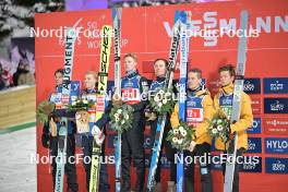13.01.2024, Wisla, Poland (POL): Halvor Egner Granerud (NOR), Johann Andre Forfang (NOR), Lovro Kos (SLO), Anze Lanisek (SLO), Stephan Leyhe (GER), Andreas Wellinger (GER), (l-r) - FIS world cup ski jumping men, super team HS140, Wisla (POL). www.nordicfocus.com. © Reichert/NordicFocus. Every downloaded picture is fee-liable.
