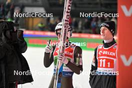20.01.2024, Zakopane, Poland (POL): Domen Prevc (SLO), Lovro Kos (SLO), (l-r) - FIS world cup ski jumping men, team HS140, Zakopane (POL). www.nordicfocus.com. © Reichert/NordicFocus. Every downloaded picture is fee-liable.