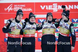 26.01.2024, Bad Mitterndorf, Germany (GER): Timi Zajc (SLO), Peter Prevc (SLO), Lovro Kos (SLO), Domen Prevc (SLO), (l-r) - FIS world championships ski flying men, medals, Bad Mitterndorf (GER). www.nordicfocus.com. © Thibaut/NordicFocus. Every downloaded picture is fee-liable.