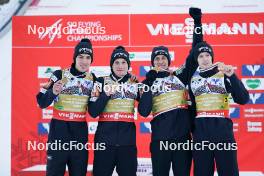 26.01.2024, Bad Mitterndorf, Germany (GER): Timi Zajc (SLO), Peter Prevc (SLO), Lovro Kos (SLO), Domen Prevc (SLO), (l-r) - FIS world championships ski flying men, medals, Bad Mitterndorf (GER). www.nordicfocus.com. © Thibaut/NordicFocus. Every downloaded picture is fee-liable.