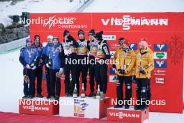 26.01.2024, Bad Mitterndorf, Germany (GER): Stefan Kraft (AUT), Jan Hoerl (AUT), Manuel Fettner (AUT), Michael Hayboeck (AUT), Timi Zajc (SLO), Domen Prevc (SLO), Peter Prevc (SLO), Lovro Kos (SLO), (l-r) - FIS world championships ski flying men, medals, Bad Mitterndorf (GER). www.nordicfocus.com. © Thibaut/NordicFocus. Every downloaded picture is fee-liable.