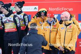 26.01.2024, Bad Mitterndorf, Germany (GER): Pius Paschke (GER), Karl Geiger (GER), Stephan Leyhe (GER), Andreas Wellinger (GER), (l-r) - FIS world championships ski flying men, medals, Bad Mitterndorf (GER). www.nordicfocus.com. © Thibaut/NordicFocus. Every downloaded picture is fee-liable.