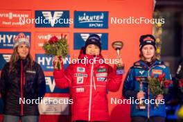 03.01.2024, Villach, Austria (AUT): Abigail Strate (CAN), Yuki Ito (JPN), Julia Muehlbacher (AUT), (l-r)  - FIS world cup ski jumping women, individual HS98, Villach (AUT). www.nordicfocus.com. © Barbieri/NordicFocus. Every downloaded picture is fee-liable.