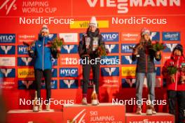 03.01.2024, Villach, Austria (AUT): Eva Pinkelnig (AUT), Nika Prevc (SLO), Abigail Strate (CAN), (l-r)  - FIS world cup ski jumping women, individual HS98, Villach (AUT). www.nordicfocus.com. © Barbieri/NordicFocus. Every downloaded picture is fee-liable.